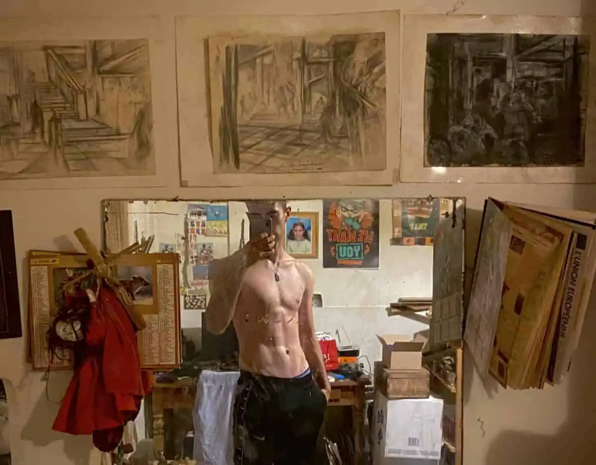 handsome shirtless artist