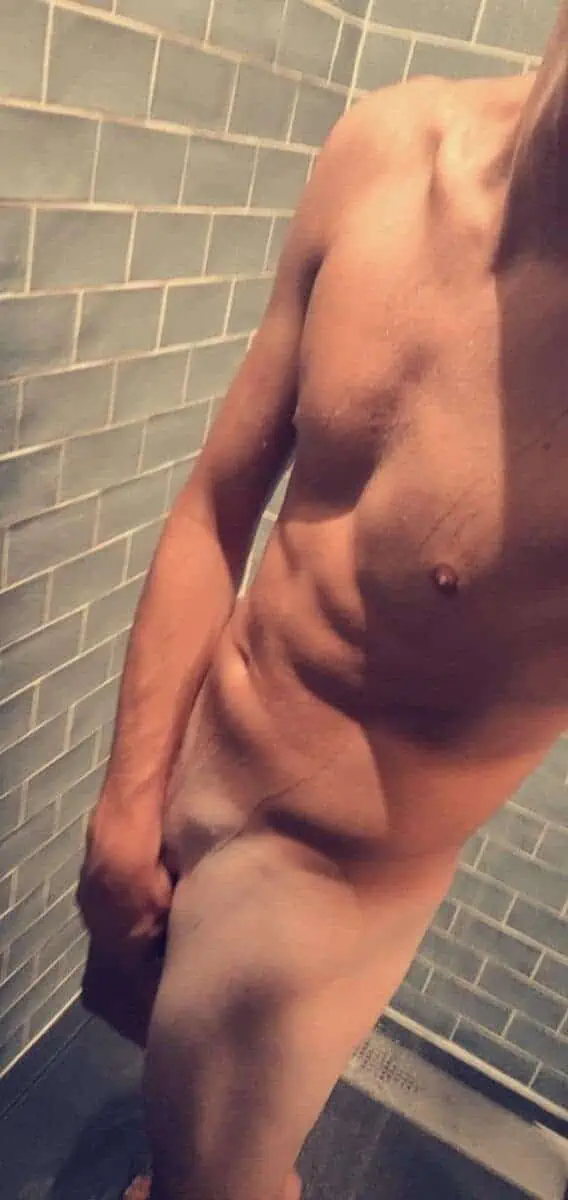 nude muscular guy in shower